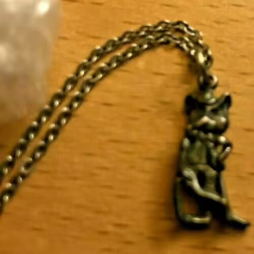 File:Chuck E. Cheese Brass Necklace (1980).avif