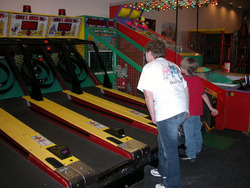 Chuck E. Cheese Roll - A photo of the game in a store.avif