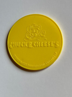 2003 '10 Free Tokens' Plastic Coin (2).avif
