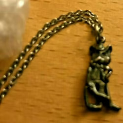 Chuck E. Cheese Brass Necklace (1980).avif