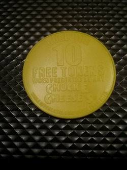 2003 '10 Free Tokens' Plastic Coin (4).avif